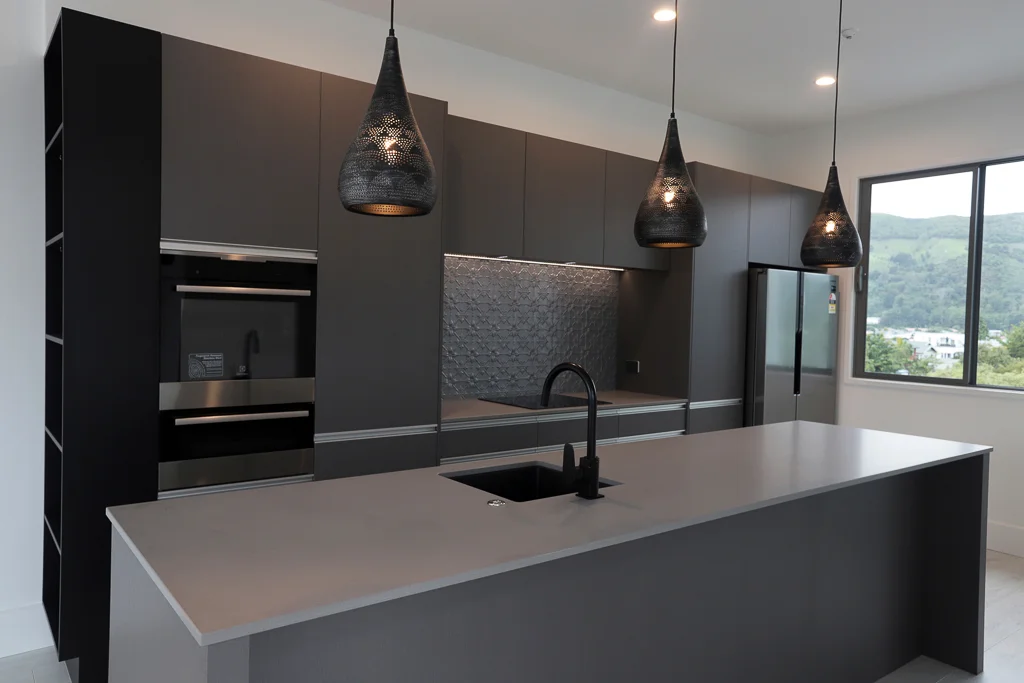 Industrial style apartment kitchen (one of three in same building)