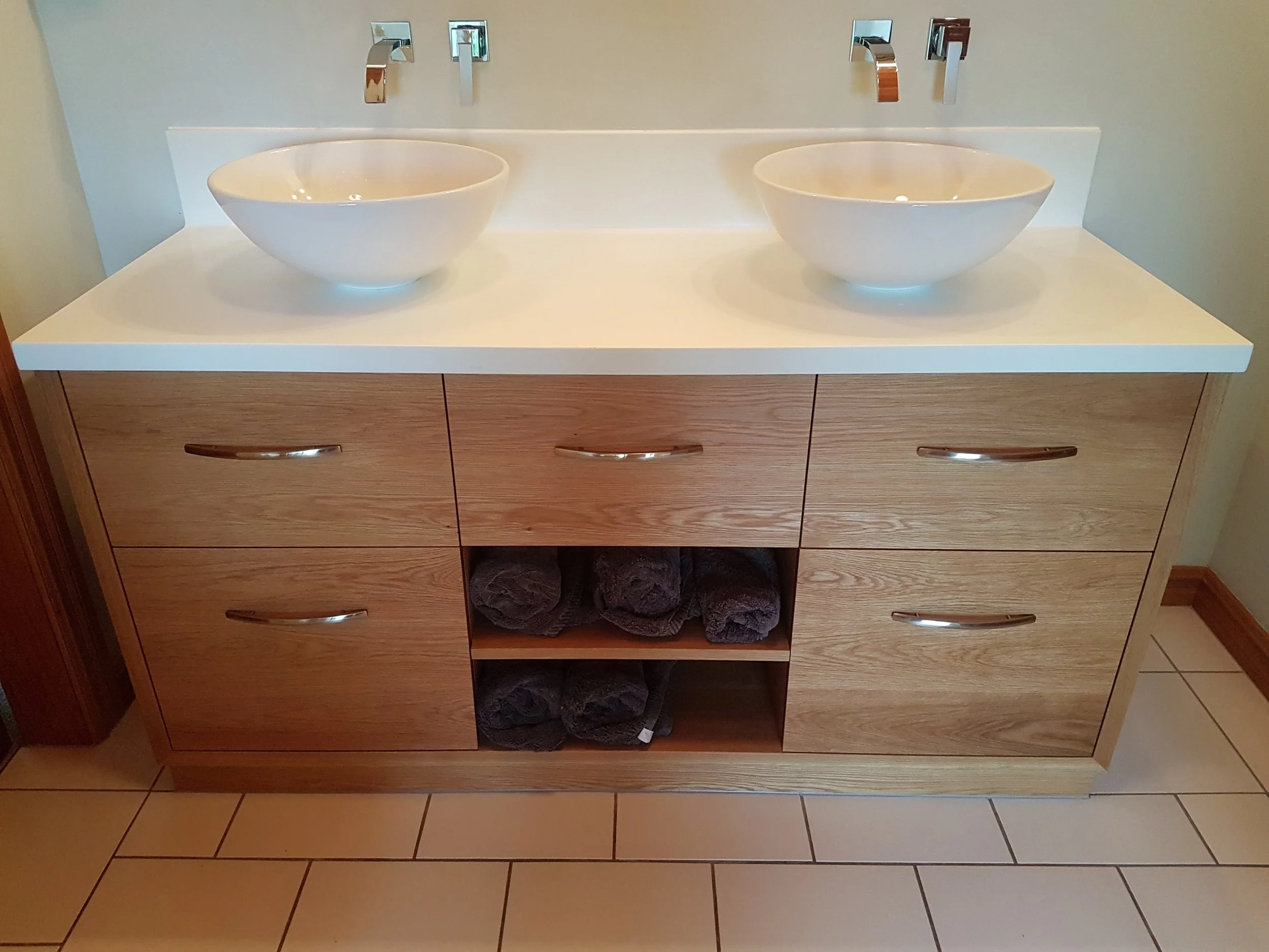 American oak vanity with acrylic top and coved upstand