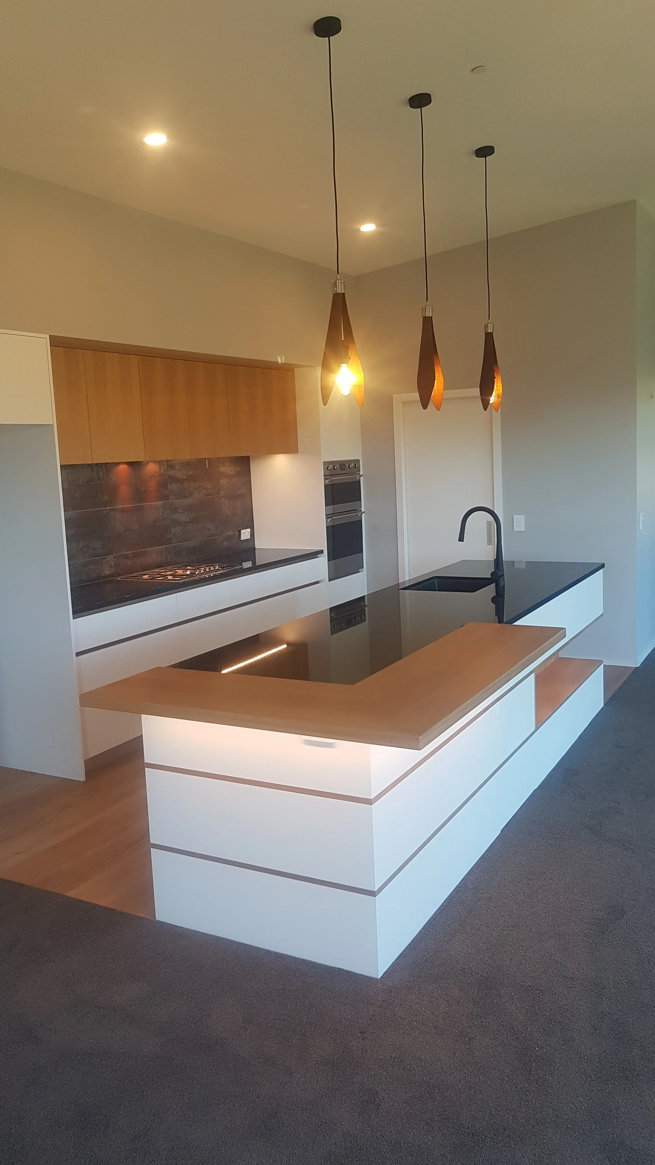 Black, white and wood kitchen