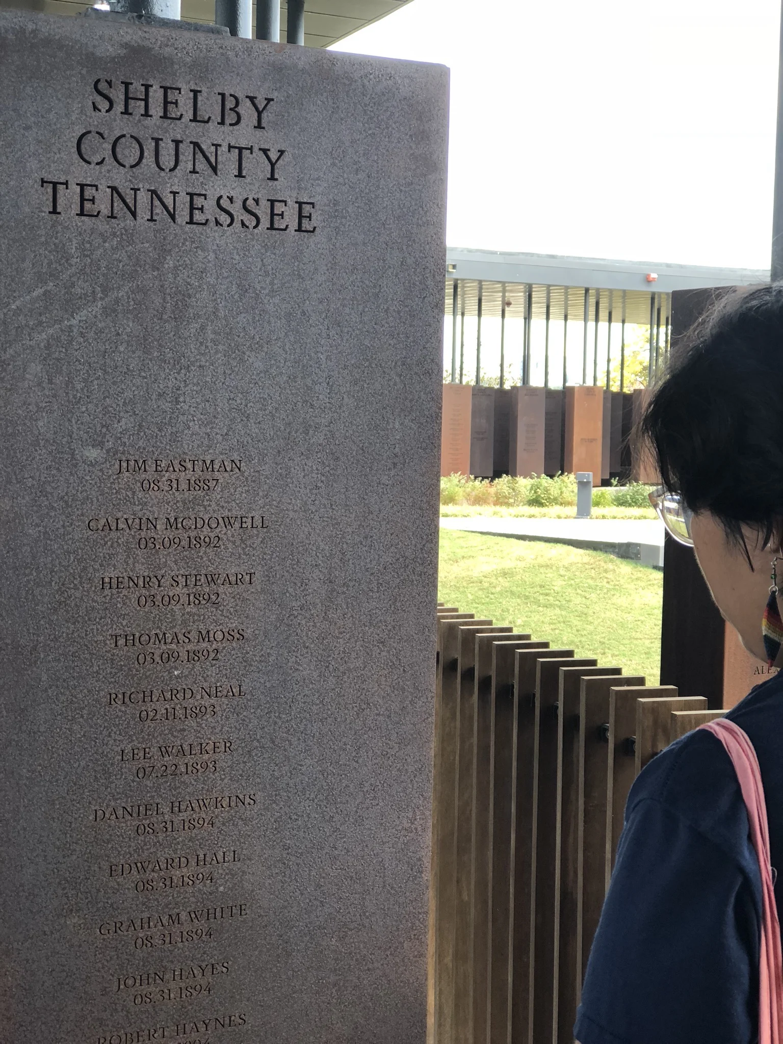 Aylen Mercado reading the names of lynching victims from Shelby County, TN.