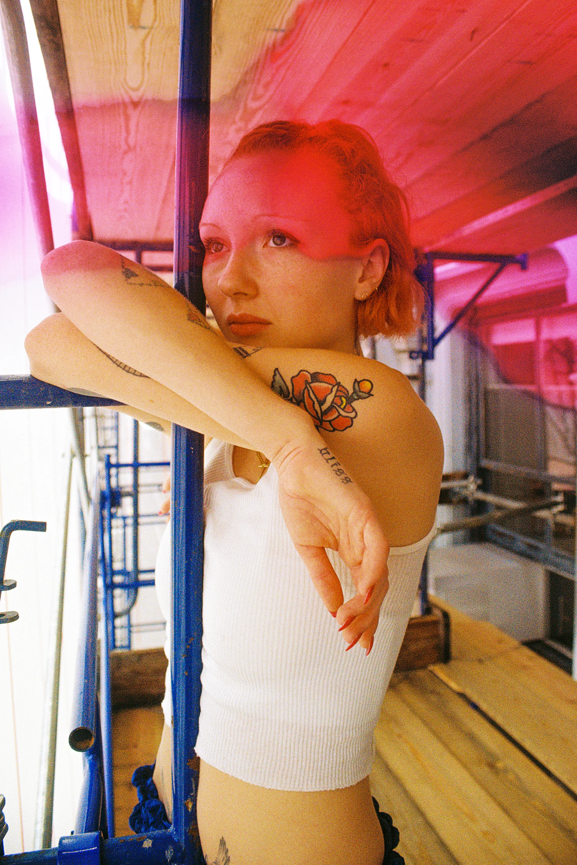 Kaleigh on the scaffolding outside of her parents apartment