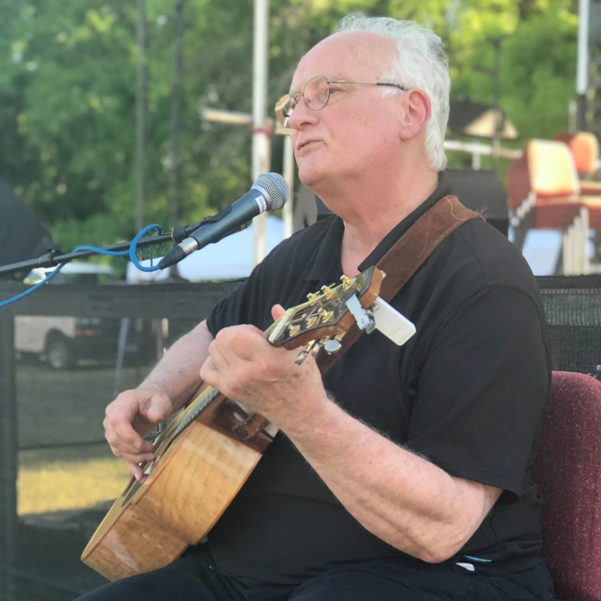 Local folk singer, Bob Warren stopped by and performed some old time folk favorites.