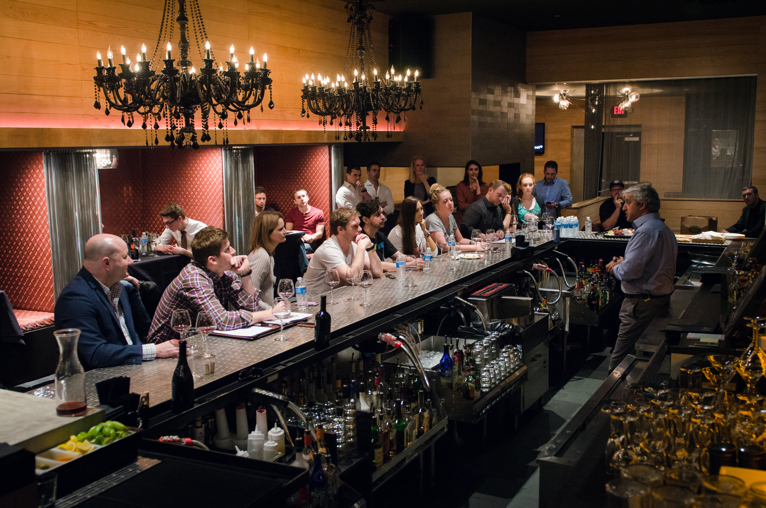 Employees taking tasting notes during the tasting