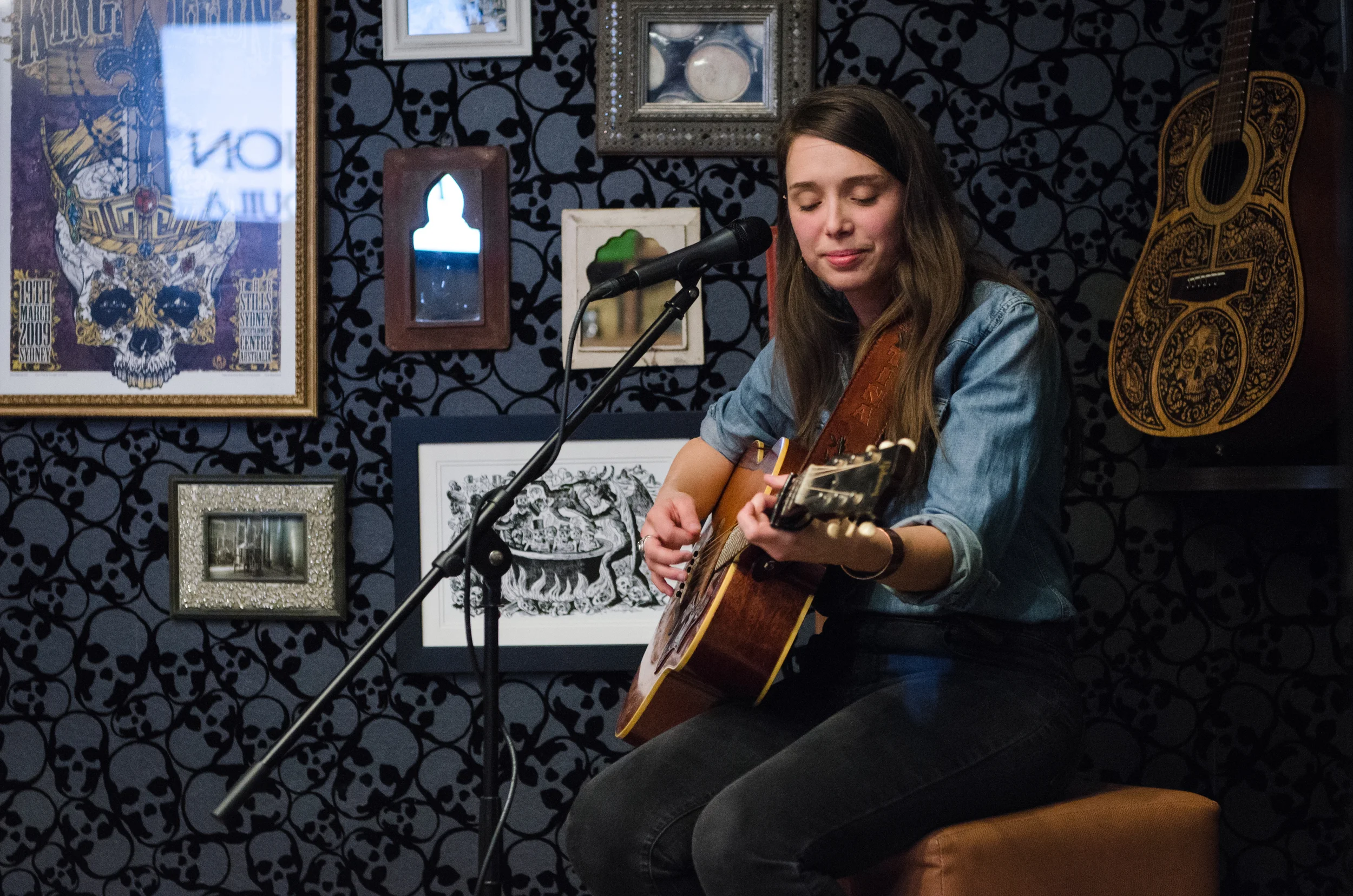 Kristina Murray strums a few chords between verses.