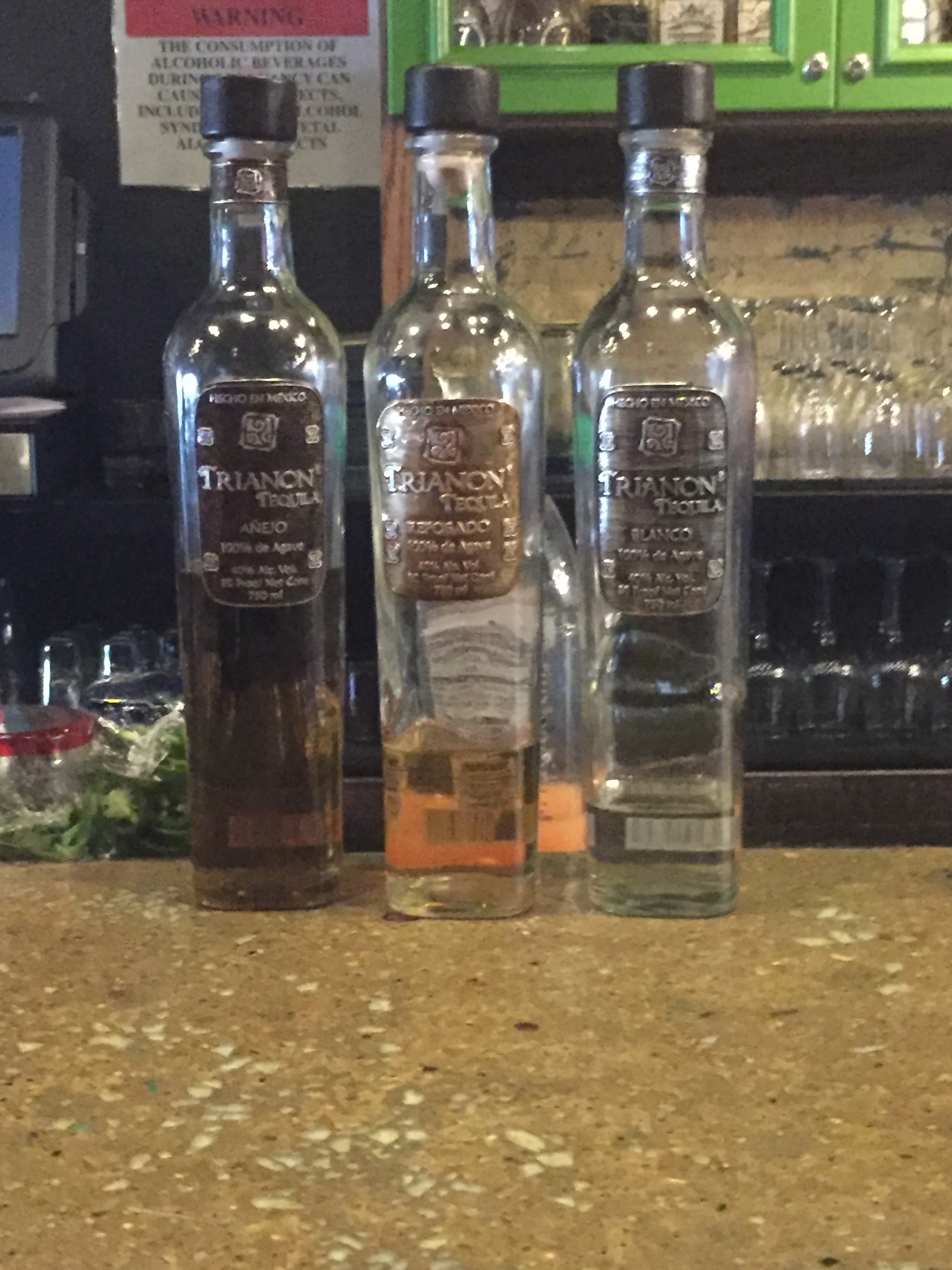 Trianon Tequila Añejo, Reposado, and Blanco.