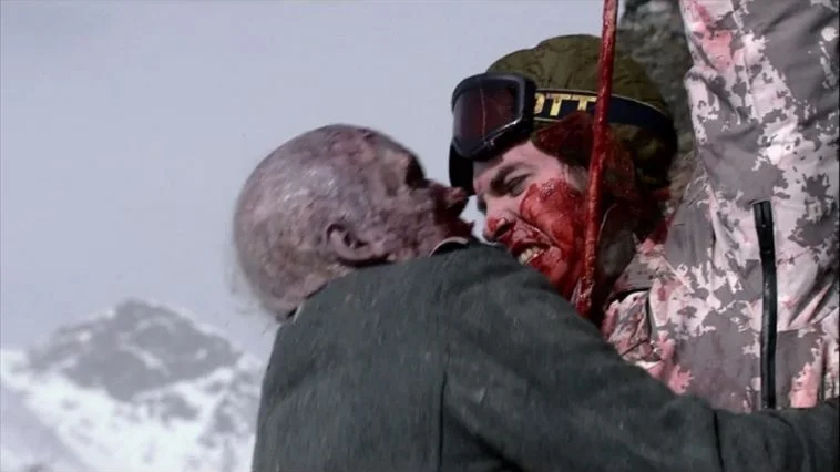 Hanging by some entrails whilst getting bitten on by some thirsty zombie. Tough day.