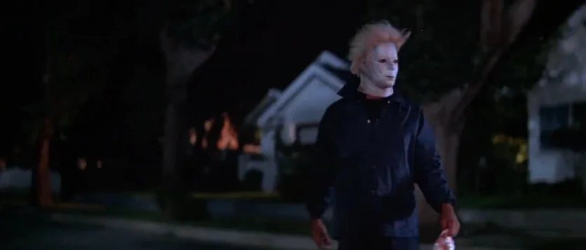 Don’t know why this kid is dressed up exactly like Michael Myers but at least the movie shows more of the town.