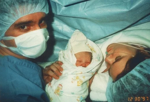 Nicholas' birth. I didn't hold him until he was several hours old, bathed and diapered. Mike had to kidnap him from the nursery and bring him to me in the recovery room - against hospital protocol.