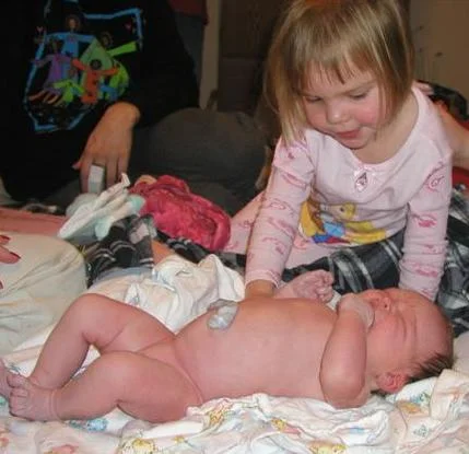6:15 am Natalie(3) wakes up to see her baby sister for the first time. She names her TUNA FISHY MOCCACHINO!