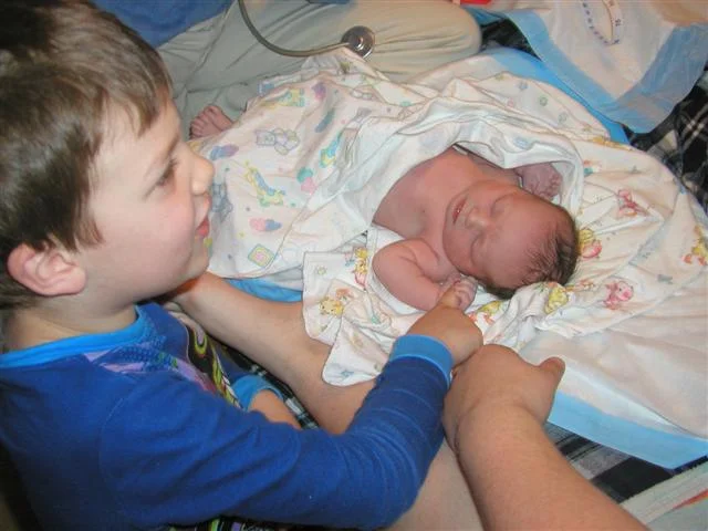 Proud big brother (x2) Nicholas (5) promptly changes her name to Julia!