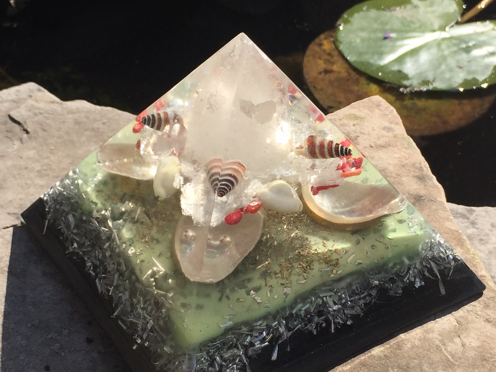 6" Orgonite pyramid with seashells