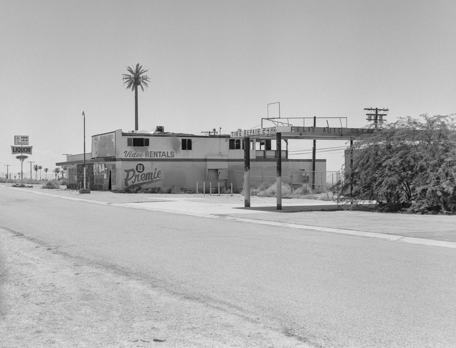 28 Aug 2016, Abandoned gas station and video store near Bombay Beach, Salton Sea, CA. Pentax 645, Tri-X 400, Developed (D76) and Scanned by me.