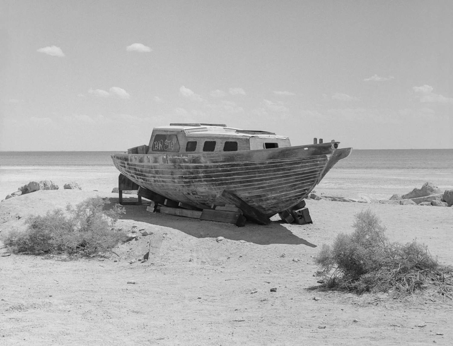28 Aug 2016, Abandoned boat, Bombay Beach, Salton Sea, CA. Pentax 645, Tri-X 400, Developed (D76) and Scanned by me.