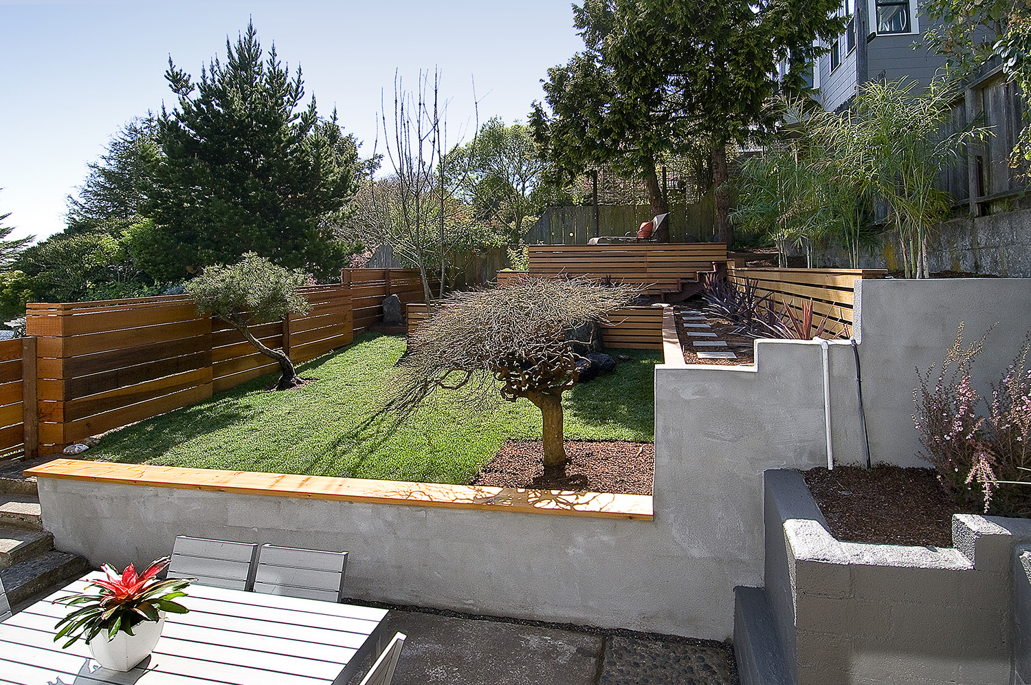 The backyard was rejuvenated with new retaining walls to make outdoor living a priority. 