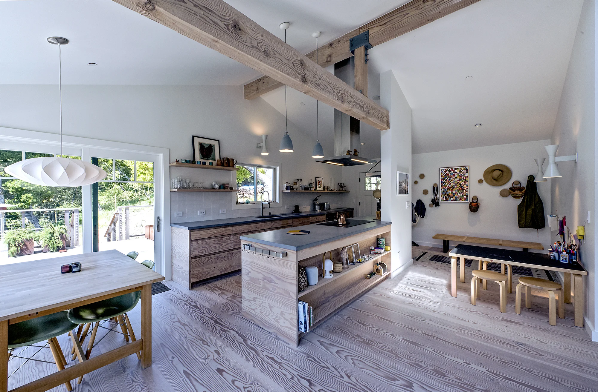 Phase II – An extensive Finish + Fixture remodel was done to the existing 1300 square feet of living space, transforming it into a “modern Danish Farm House”. The basis of the remodel was creating a new floor plane throughout, made of 10” wide flat sawn Douglas fir. The wood finish is a traditional Danish white oil. Photography by Robert Cardin