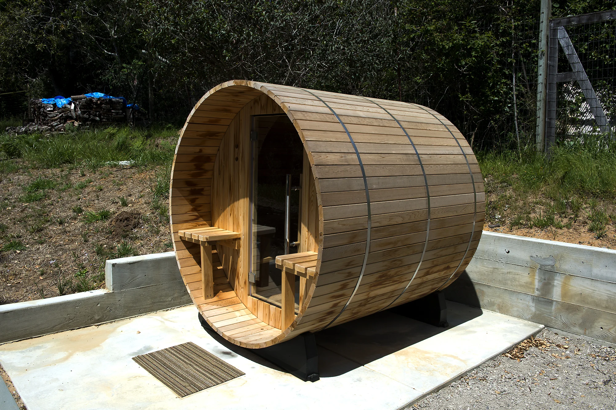 In addition, a barrel sauna, outdoor shower, and trampoline were added to the grounds. Photography by Robert Cardin