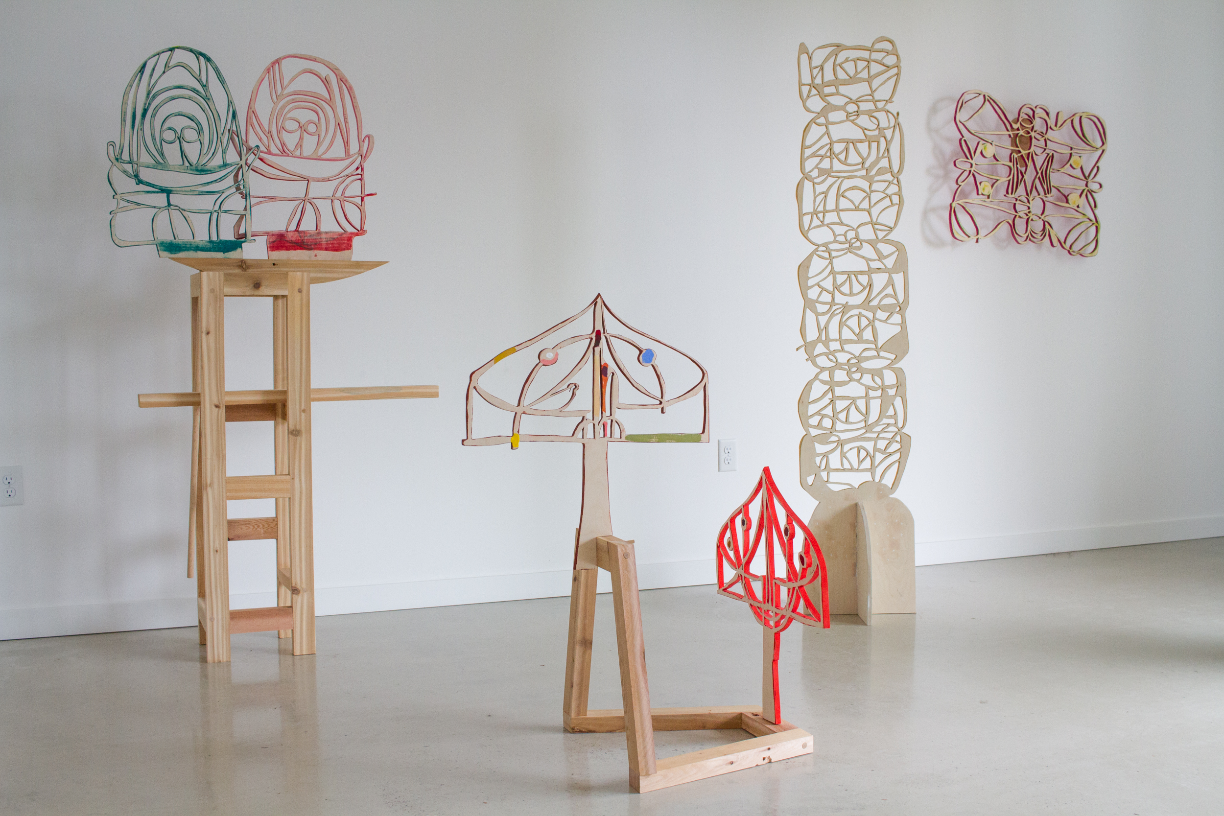  Installation view from group show “Beyond Control,” Peace Sign Gallery, Portland, OR, Jan, 2018.  L to R:  Tender Angels Of Death ,  Two Walled Gardens ,  Stalagmite ,  Moth #2   Birch plywood, cedar, flashe, birch, oak, brass, dimensions variable. 