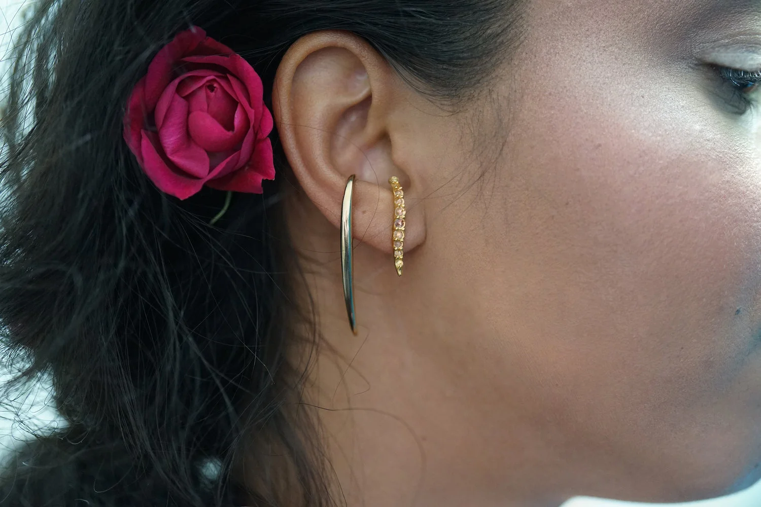 Asymmetrical Versare Stone Earrings made of hand-faceted rose cut white topaz.