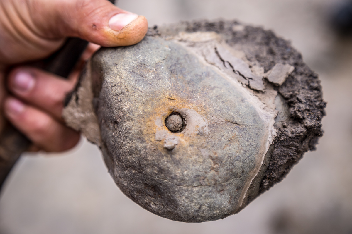 An interesting find in a river. A small stone bore itself a little pocket in a larger stone.