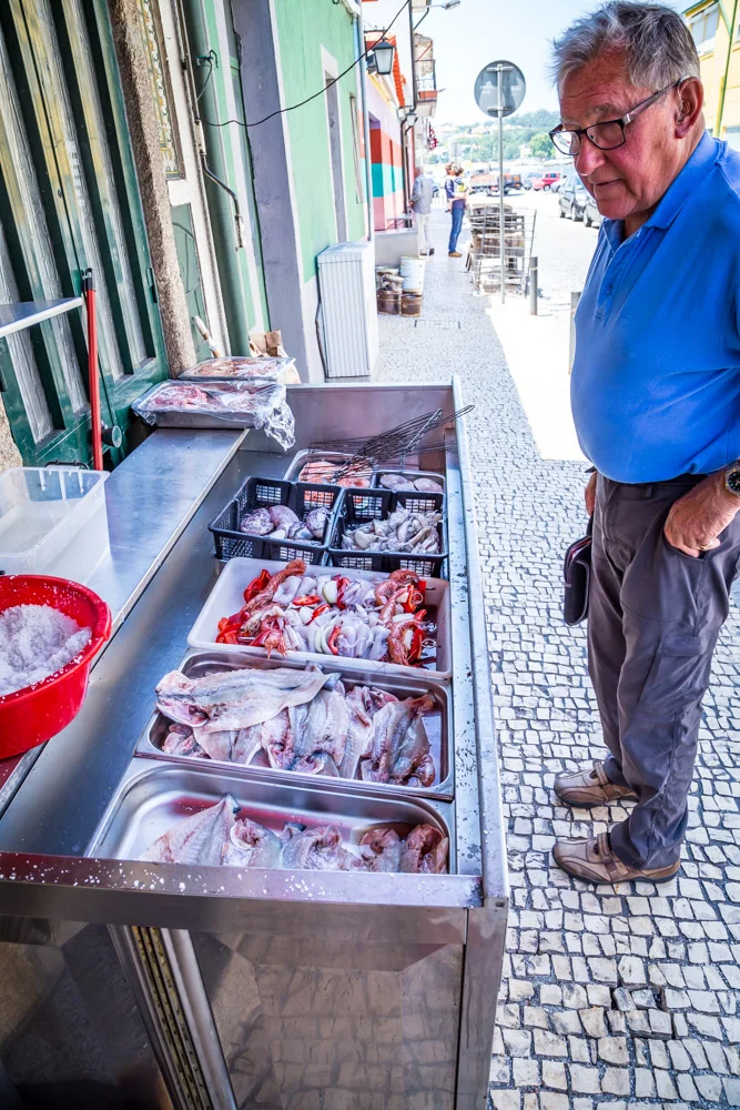Michael inspects the fresh catch.