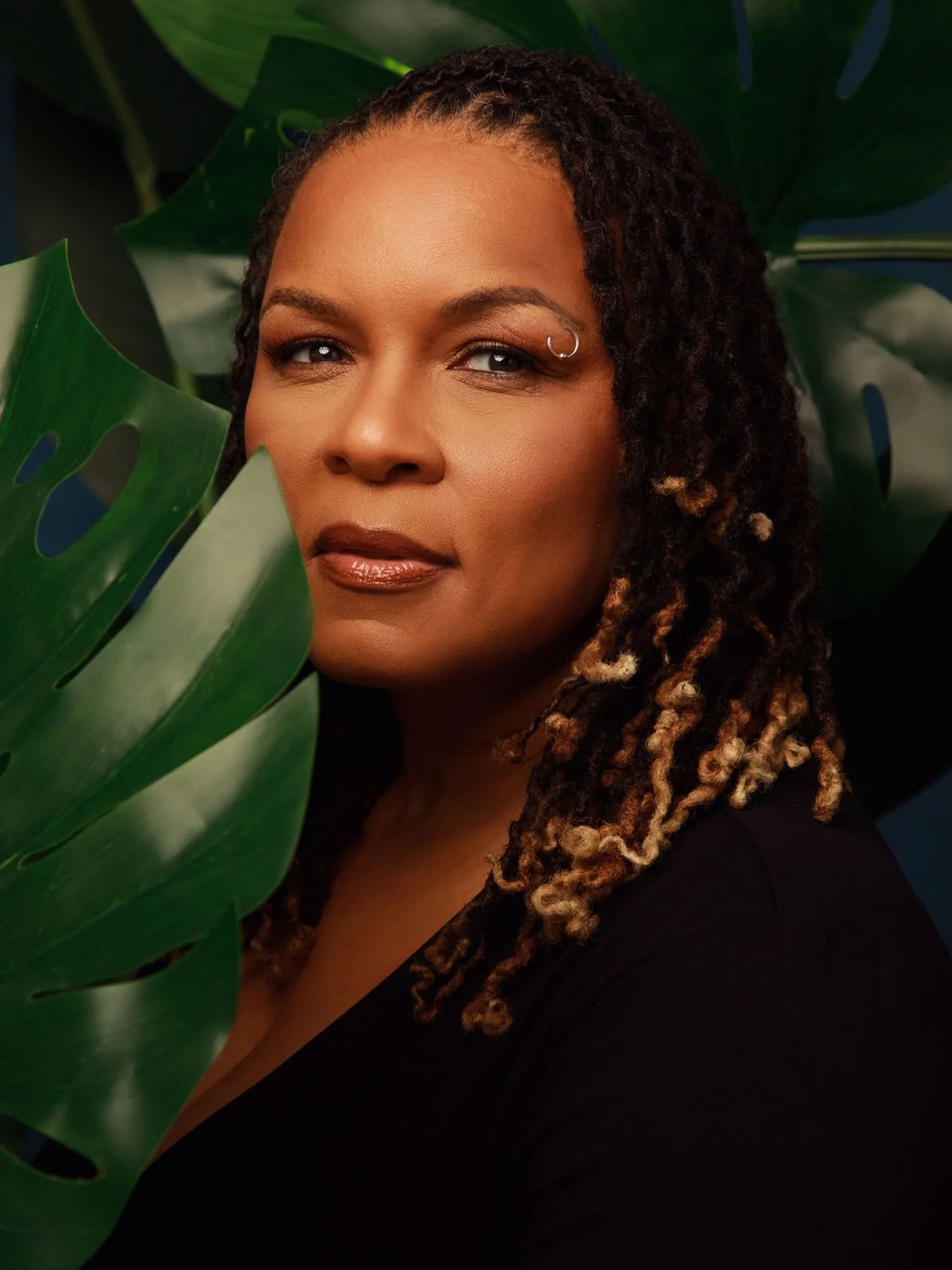 Here&rsquo;s an Instagram caption inspired by her work, her message, and the green-monstera portrait you created.

Rooted in truth. Growing toward awakening. 🌿✨

Honored to photograph Rev. Dr. Jacqueline Jenkins &mdash; a leader whose work reminds u