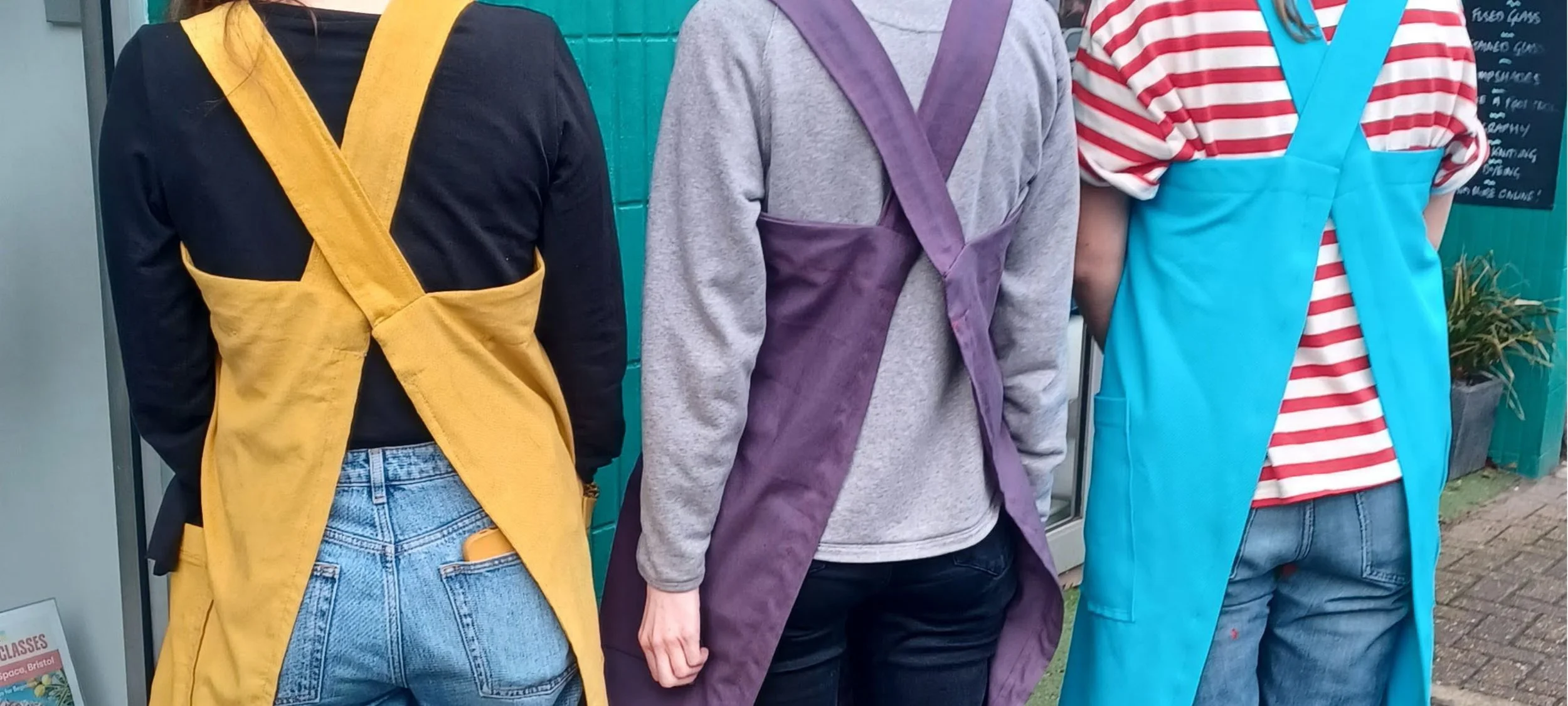 BANNER New Brewery Arts Japanese Cross Back Apron- Lauren Holloway.jpg