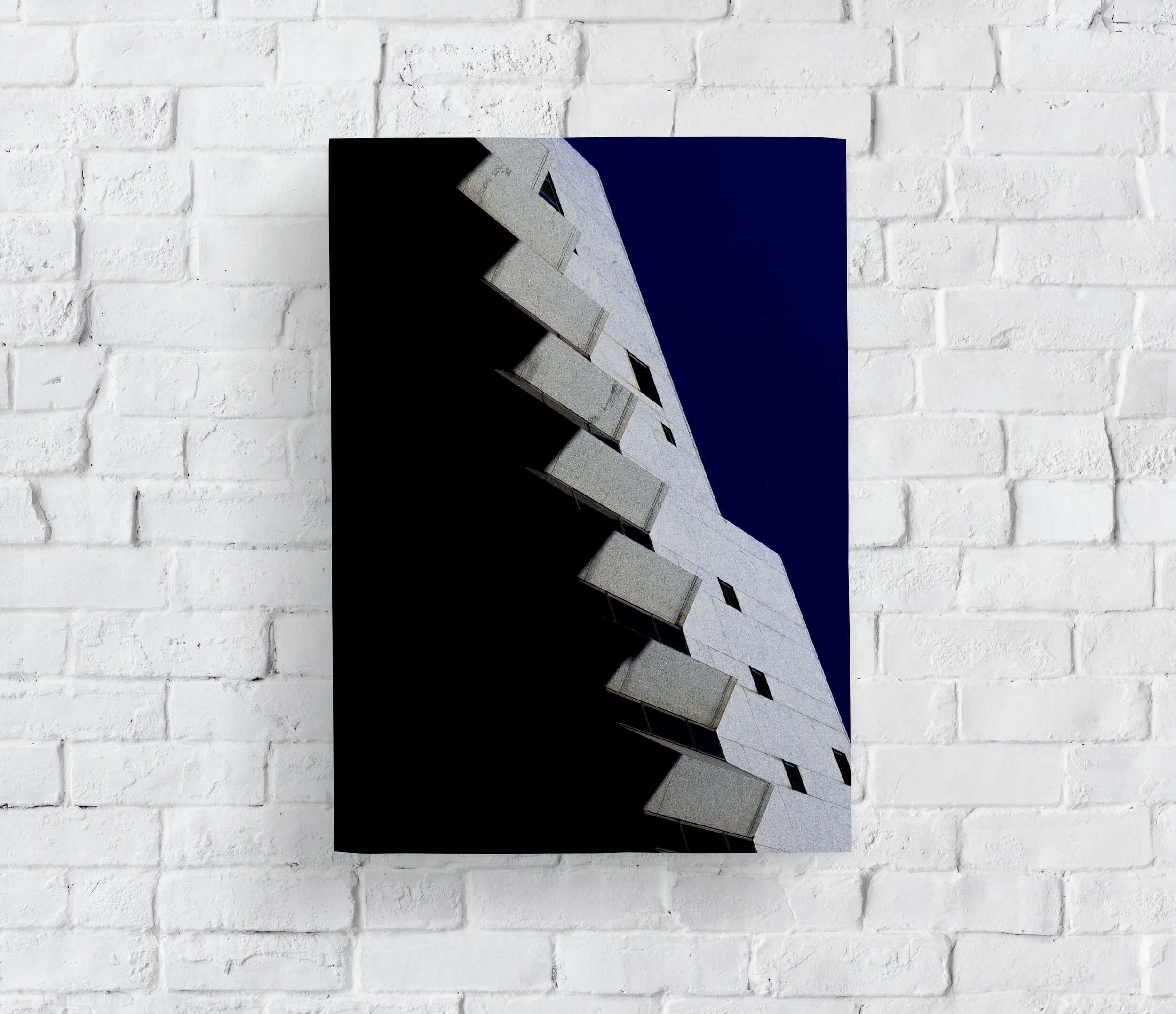 Blank poster canvas on wall.jpg