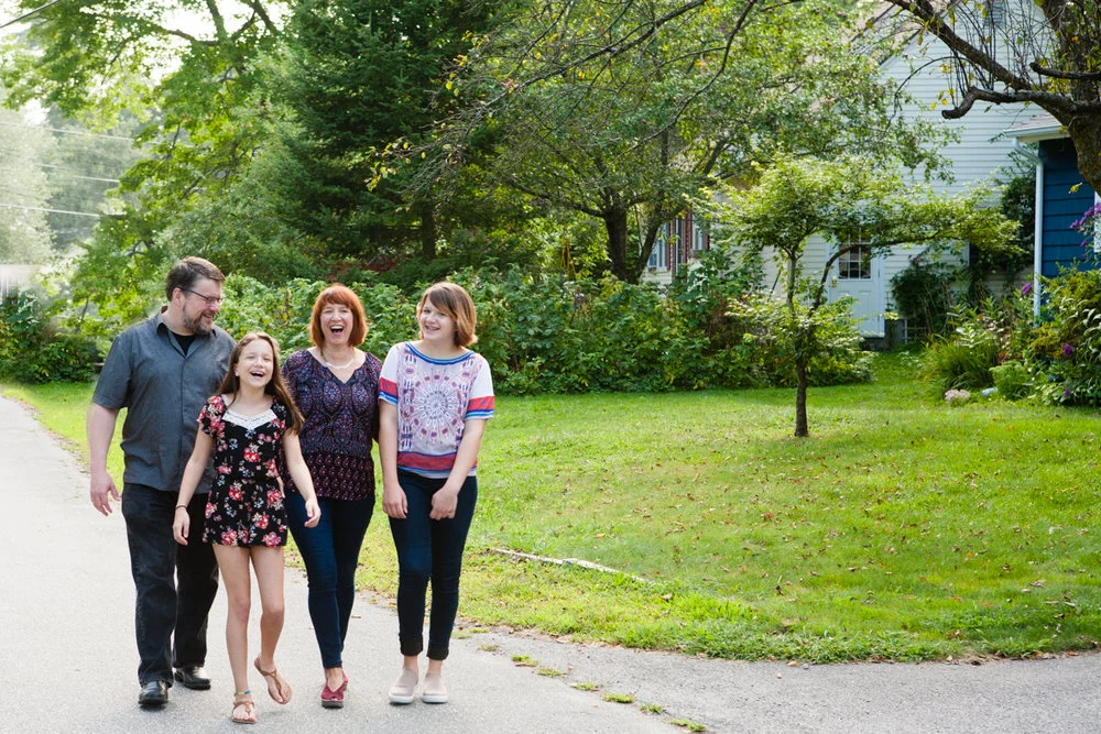 Family photograph, portrait, family walking down suburban street