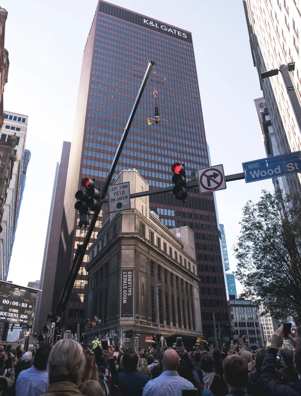 Lee Terbosic suspended above Wood Street and Liberty Avenue as Pittsburgh watches the original Houdini 100 escape in 2016