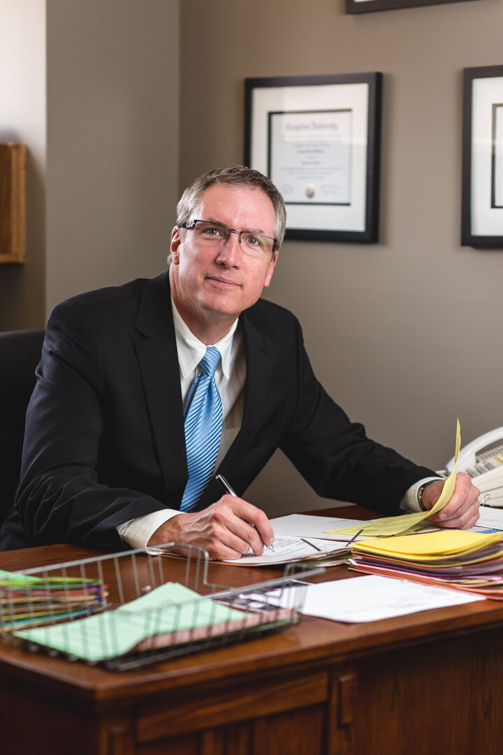 Professional environmental headshot for a doctor