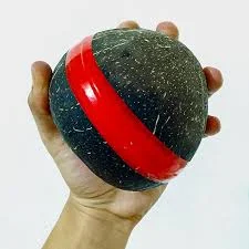 Coconut shell as a package for calamay. A Bohol delicacy. 