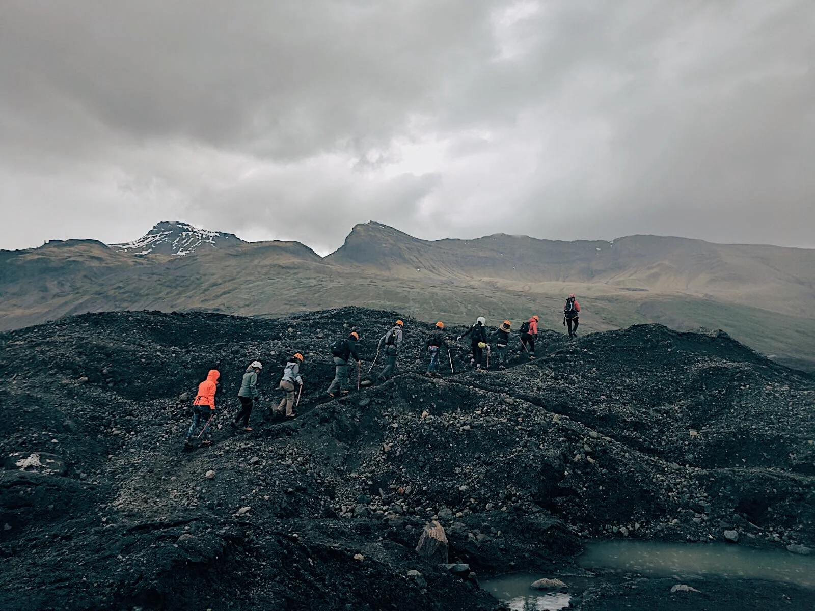 Adventure awaits you on top of a glacier with volcanic rocks. It's wise to wear your cramp-ons.