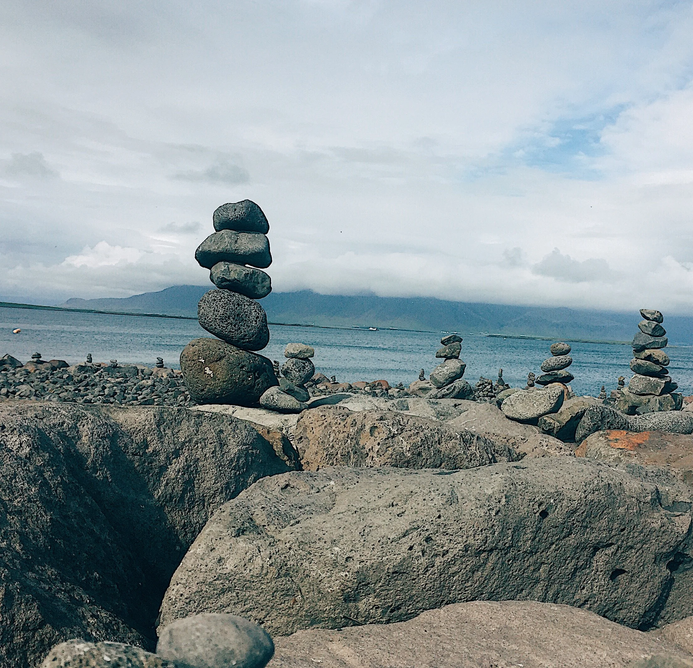 Stones on top of stones. Lots of cairns alongside roads. It was used pre-GPS days as a guide, but are discouraged as stone removal and displacement disrupts the land structure.