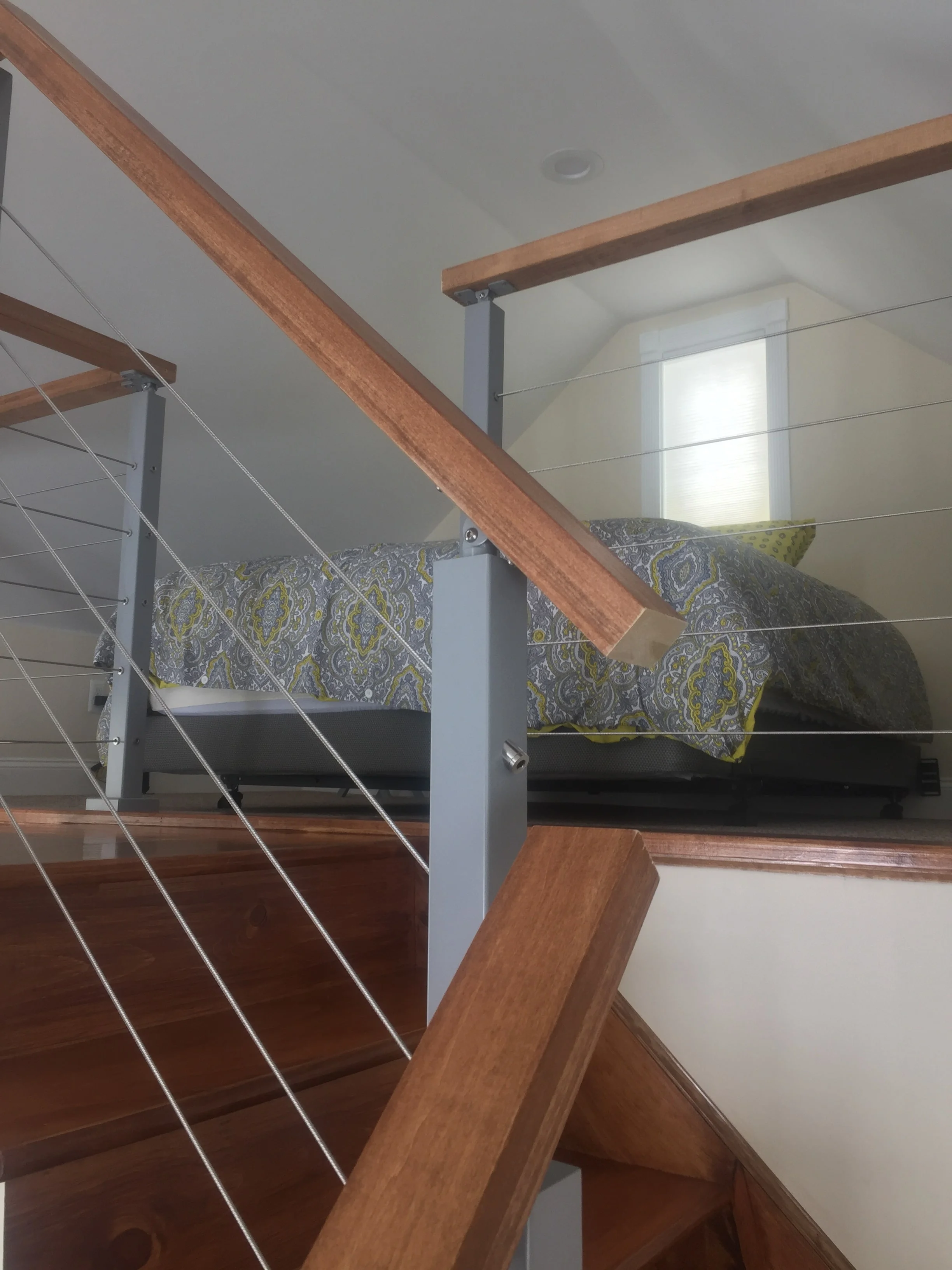 Loft bed area in a tiny home.
