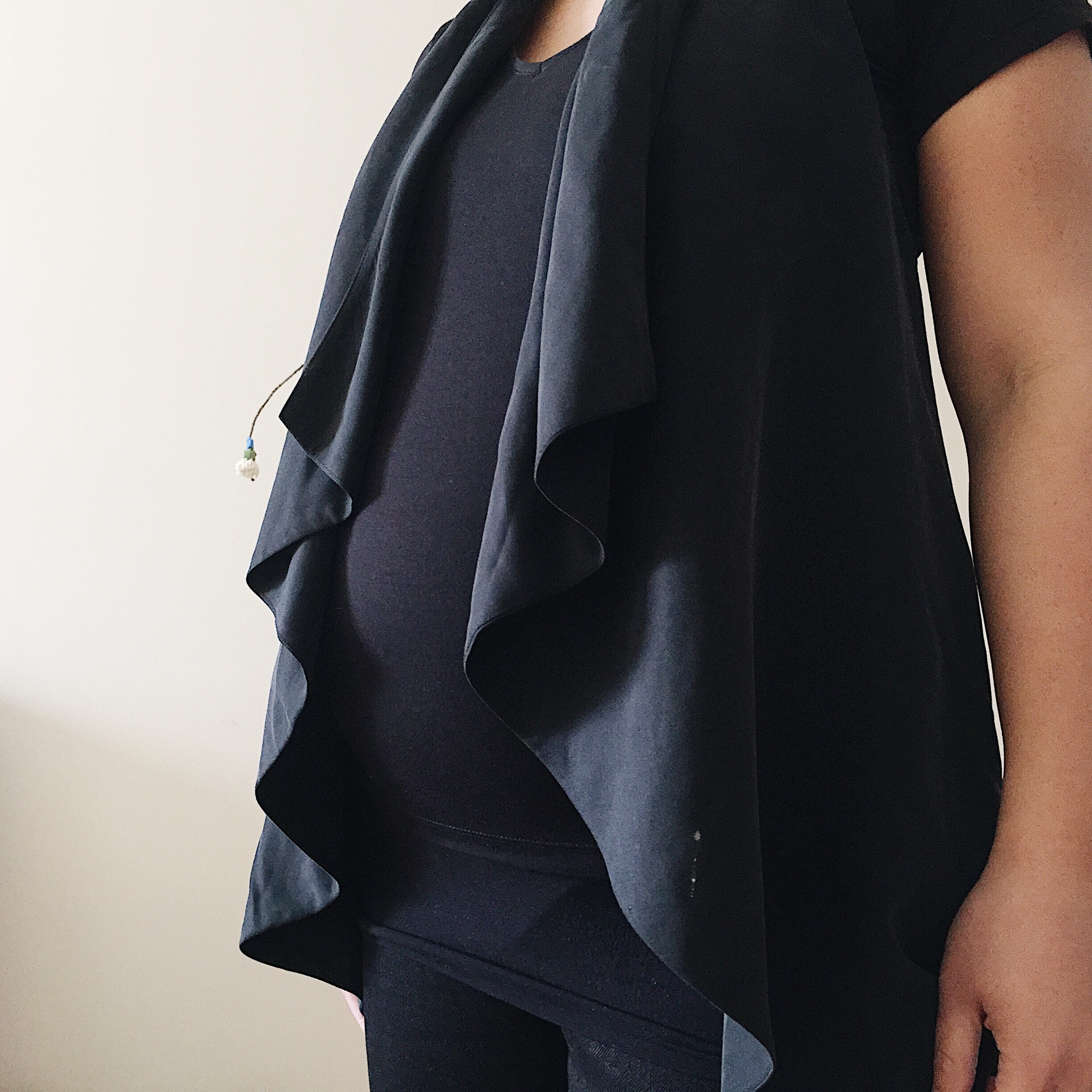 Sustainable Maternity Wear - Going with a vest that I never wore, but now seems to work.