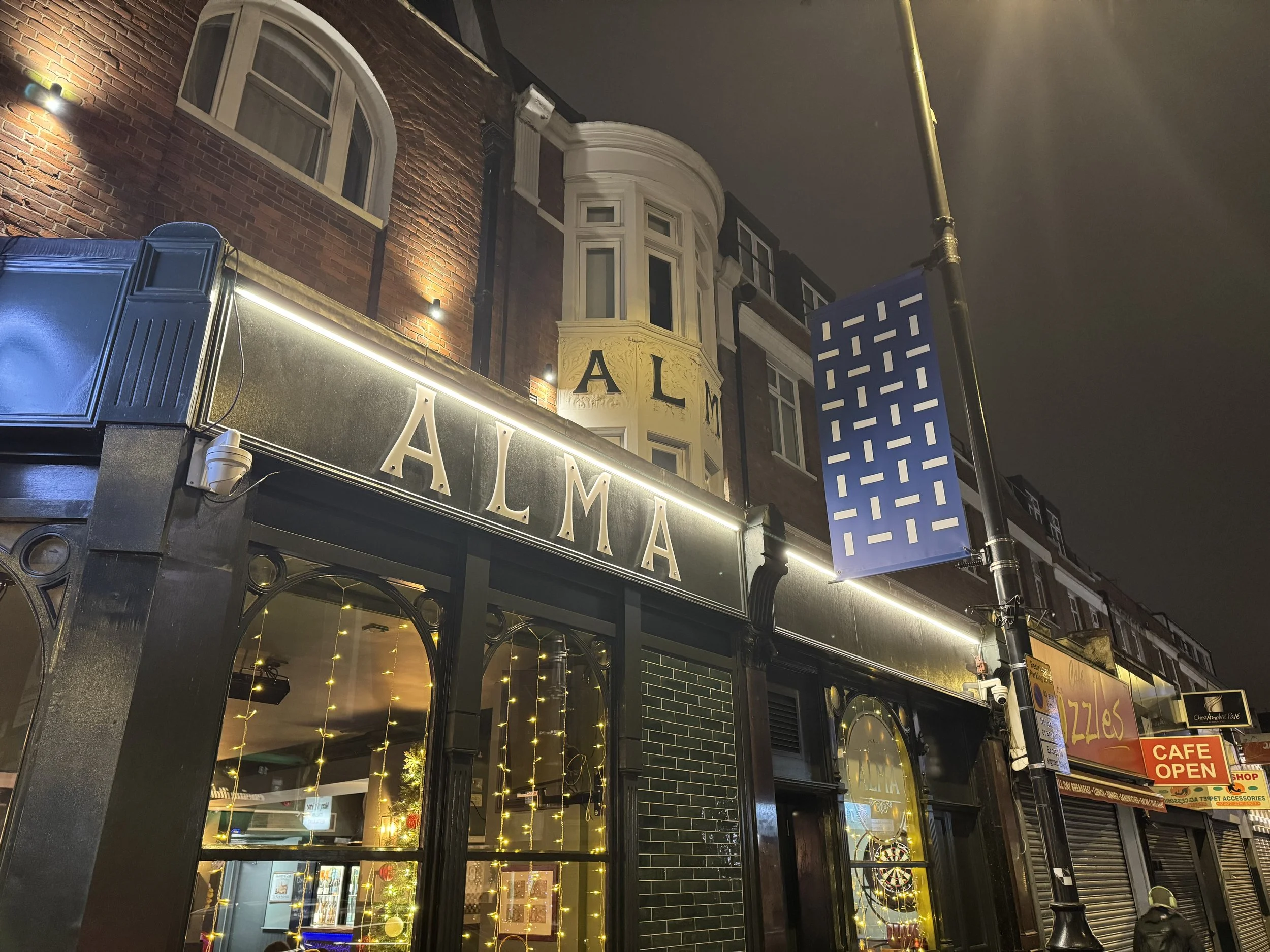 Alma Outside Night Lit Chapel Market 2.jpeg