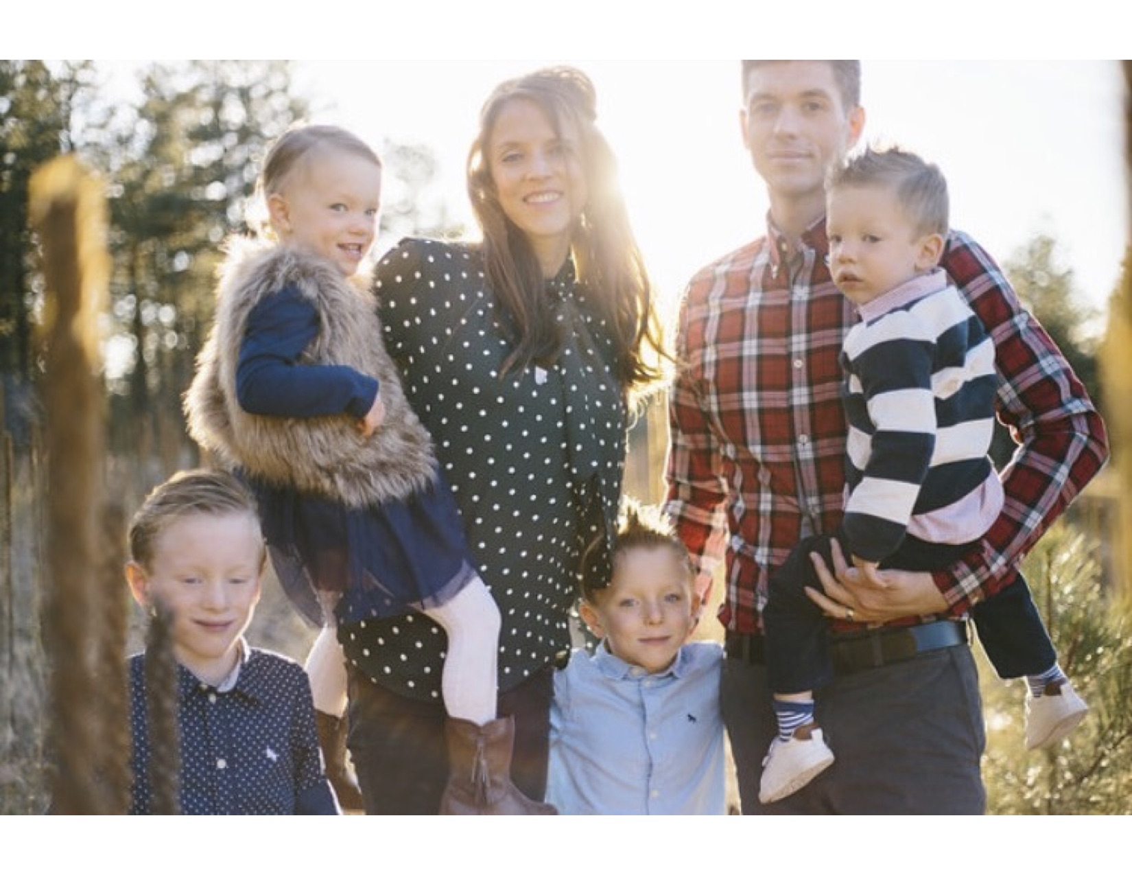 Sarah Jane and Jacob Jennings and family. Drew is standing on the left, and Sam is standing on the right.
