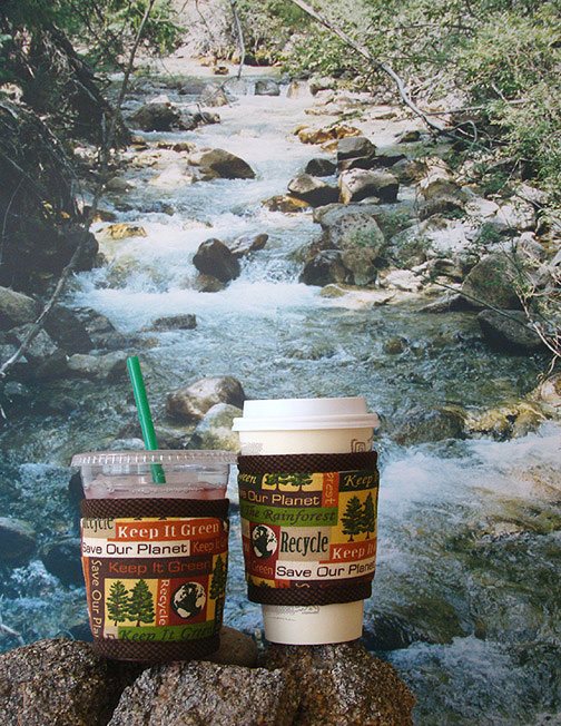 Kup Kollars are drink sleeves that work equally well for hot or cold drinks. This Recycle design will express your concern for the environment wherever you go to drink hot or iced coffee.