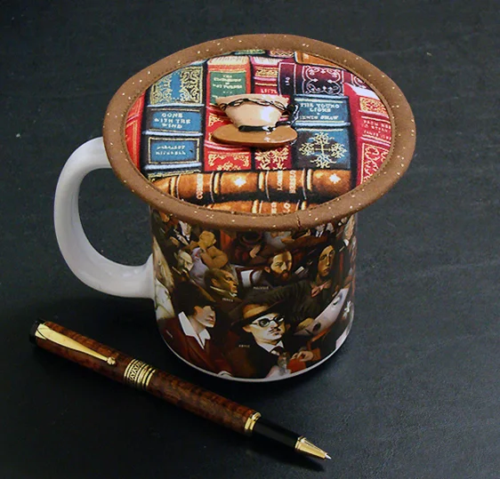Stylish Kup Kaps with matching buttons from koffeekompanions.com keep beverages hotter longer.