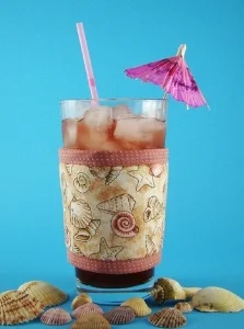 Sea shells Kup Kollar cup and glass wrap is one of more than 30 designs by Koffee Kompanions to keep drinks cold and hands comfortable.