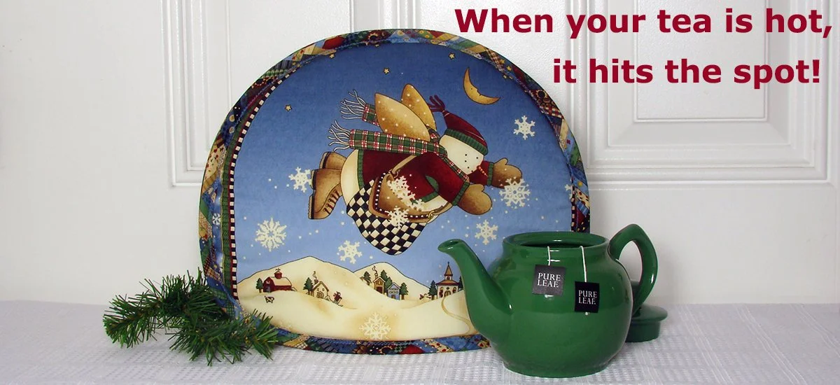 Tab Snowman Angel green teapot.jpg
