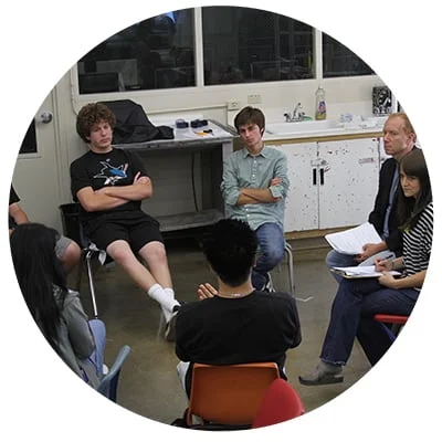 Christine Fisher and John Watson of Evergreen Education Group discuss EdReady with high school students during a day of user testing.