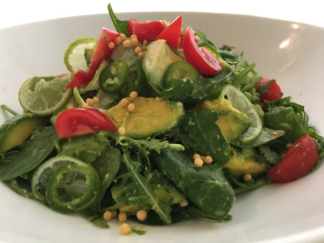 AVOCADO, LIME SLICES AND JALAPENO WITH SALAD LEAVES