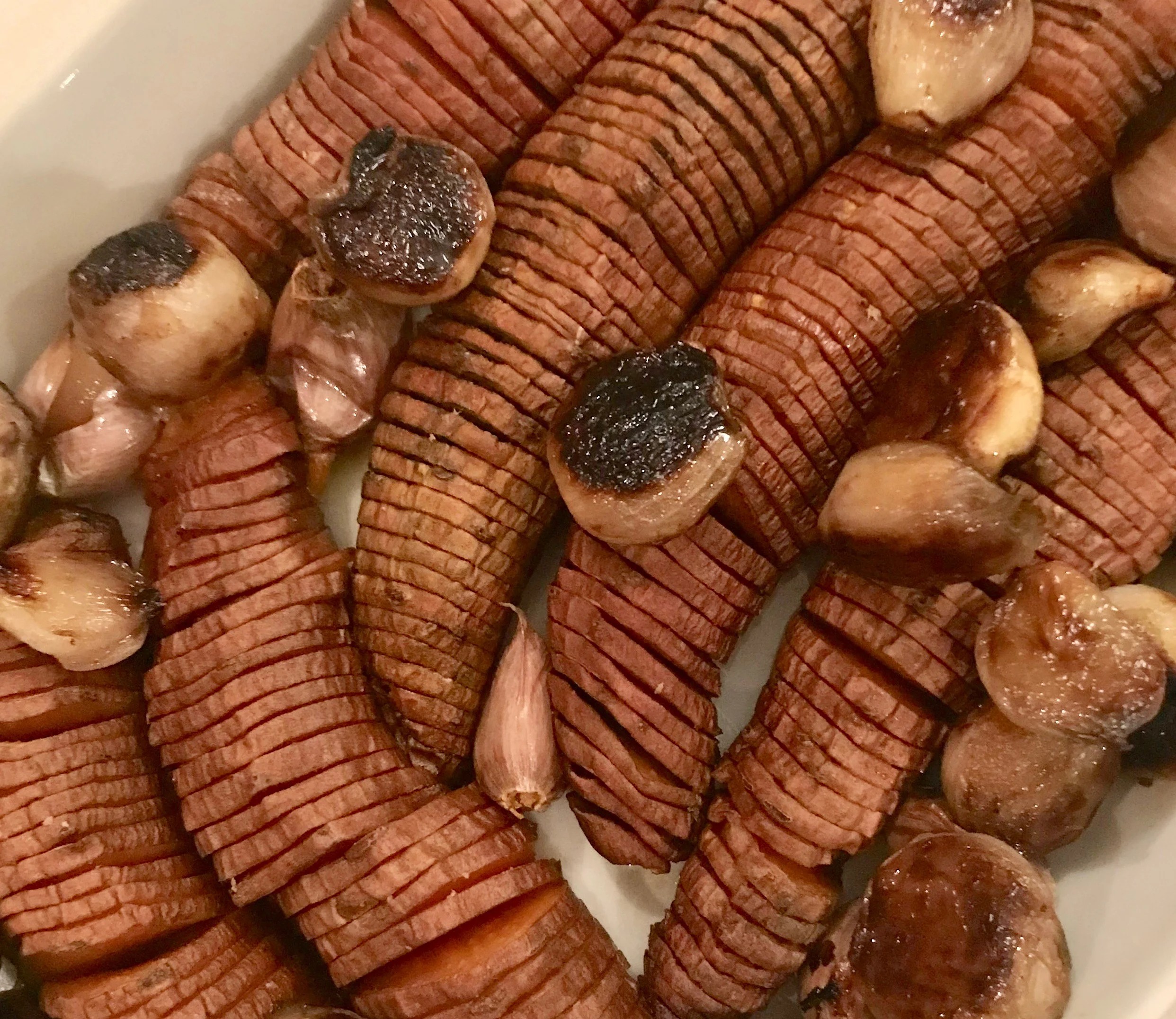 ROAST KUMERA WITH GINGER, GARLIC AND SHALLOTS