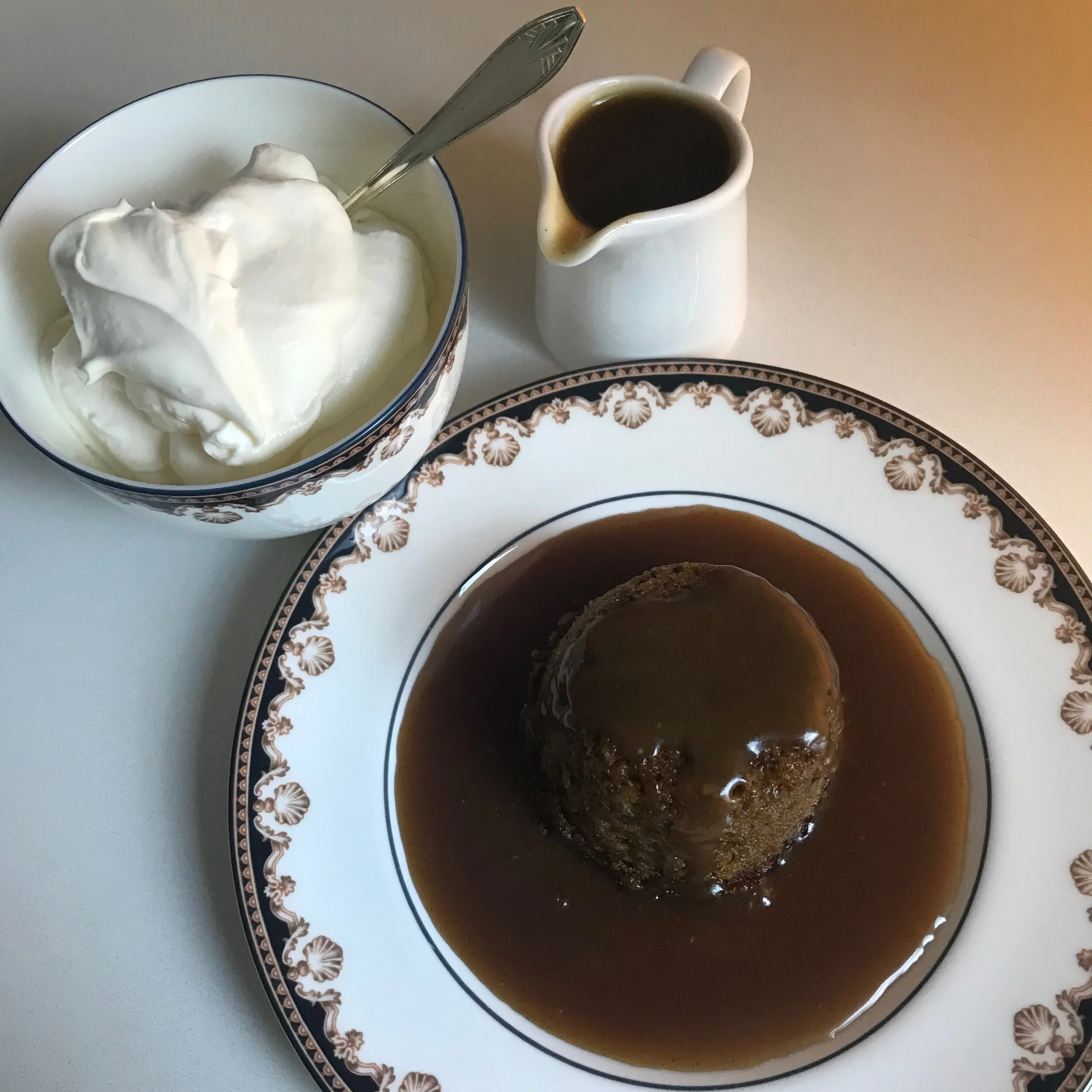 DATE PUDDING WITH TOFFEE SAUCE COMPOSED PIC WITH SAUCE.jpeg