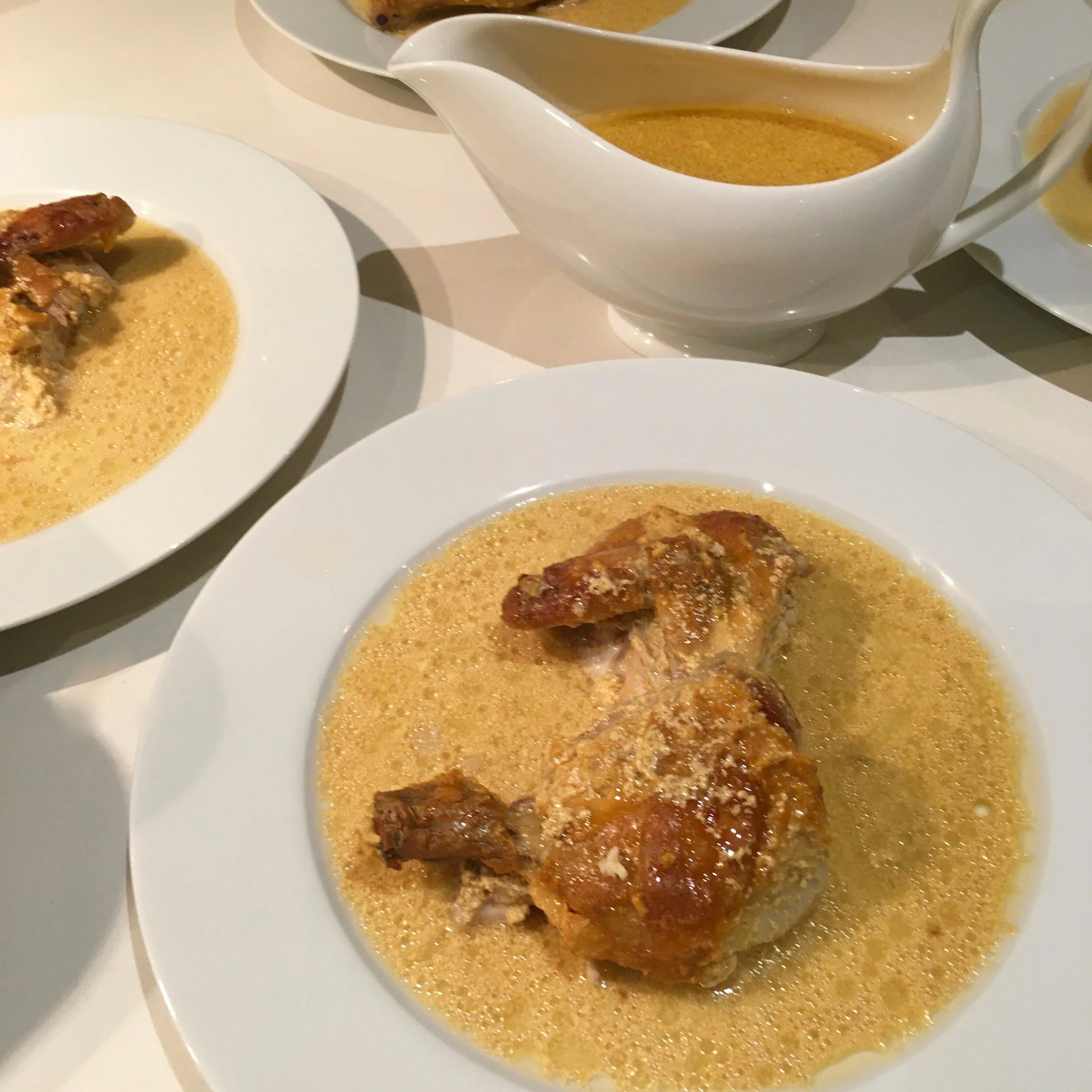 MARINATED SPATCHCOCK WITH DATE HARISSA SEVERAL PLATES SHOT.jpeg