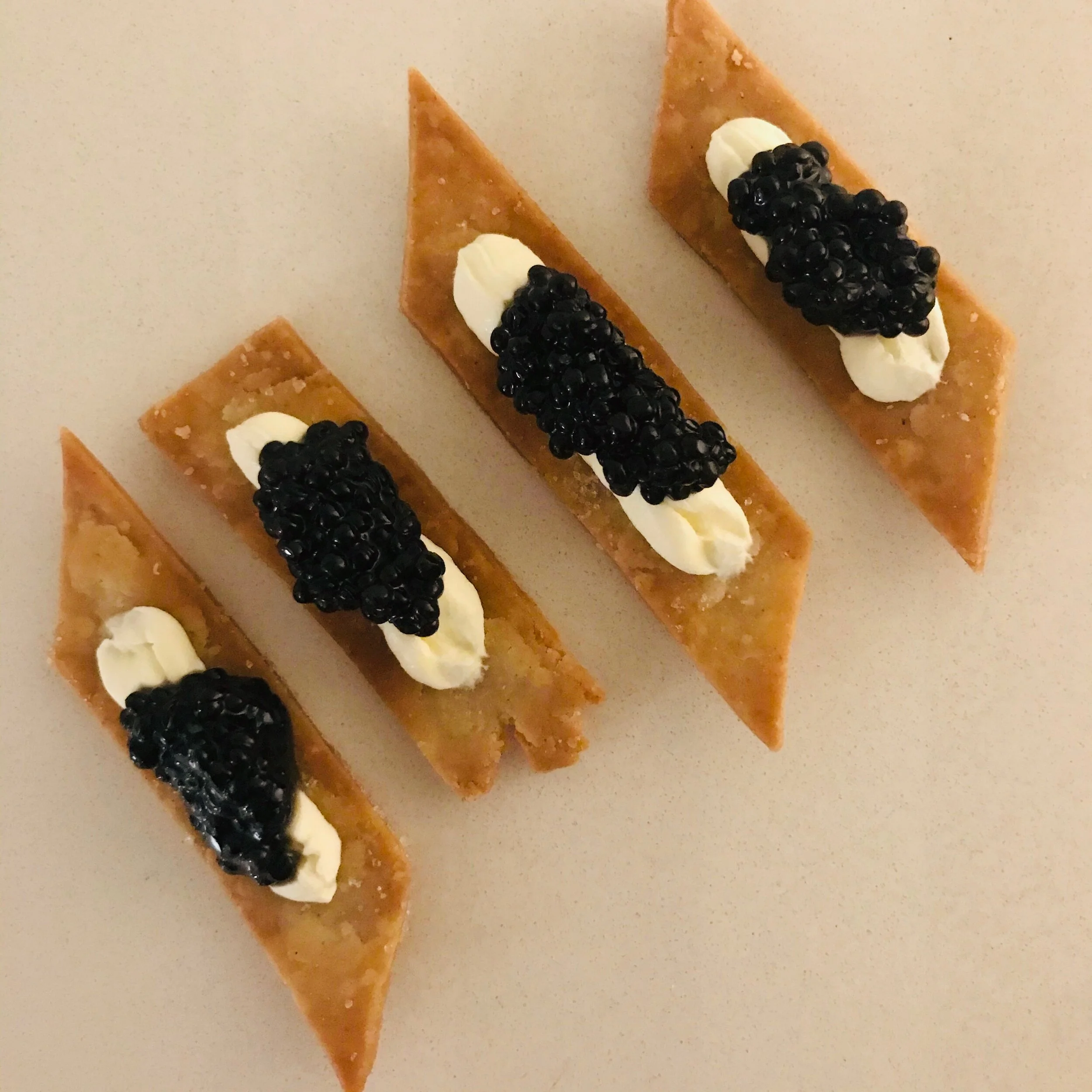 BUCKWHEAT CRACKERS WITH SOUR CREAM AND CAVIAR PIC.jpeg