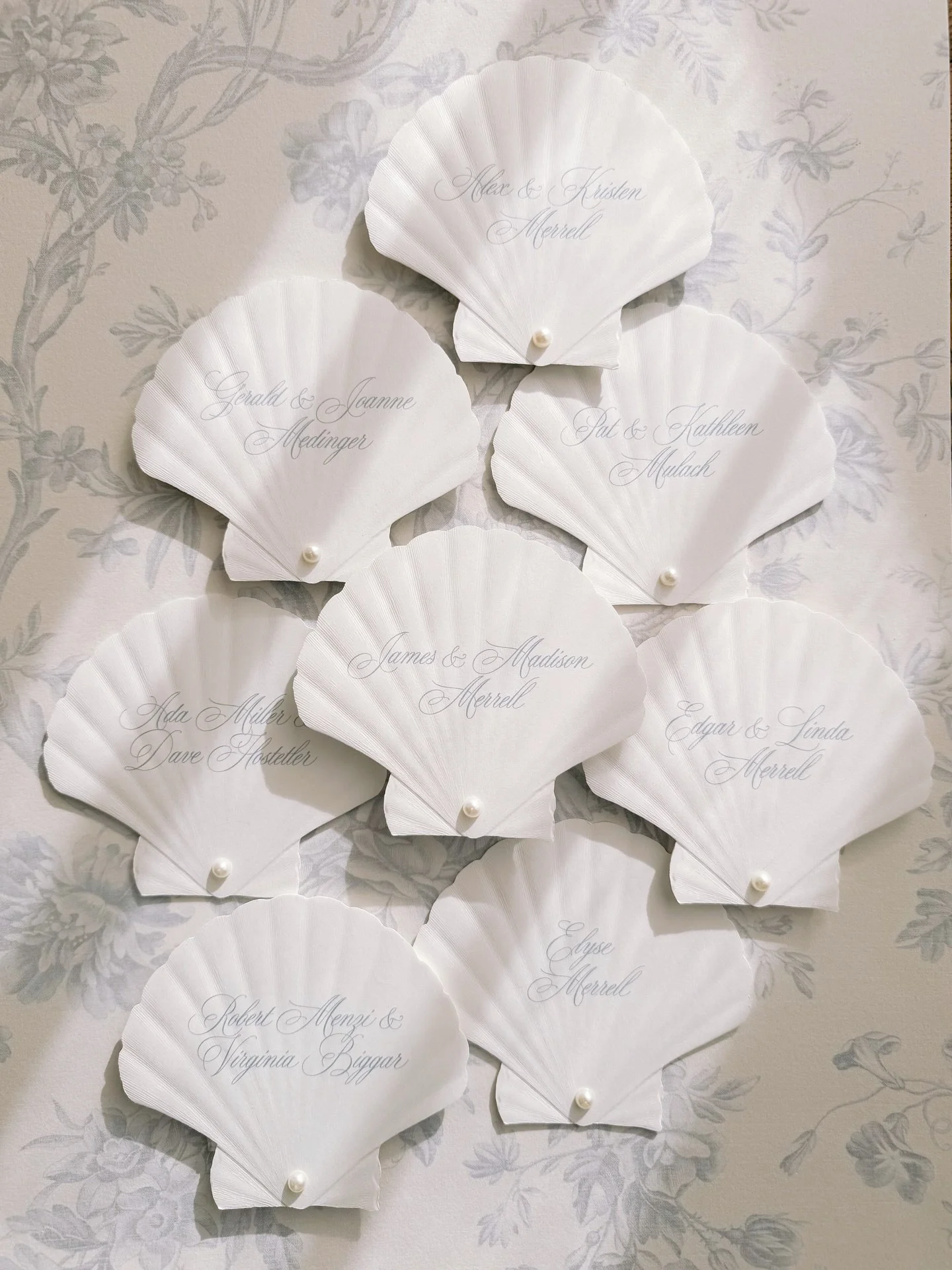 The loveliest seating cards for M&amp;J's upcoming wedding! Delicate embossed shells with pearl details make these special cards perfect for a special couple!