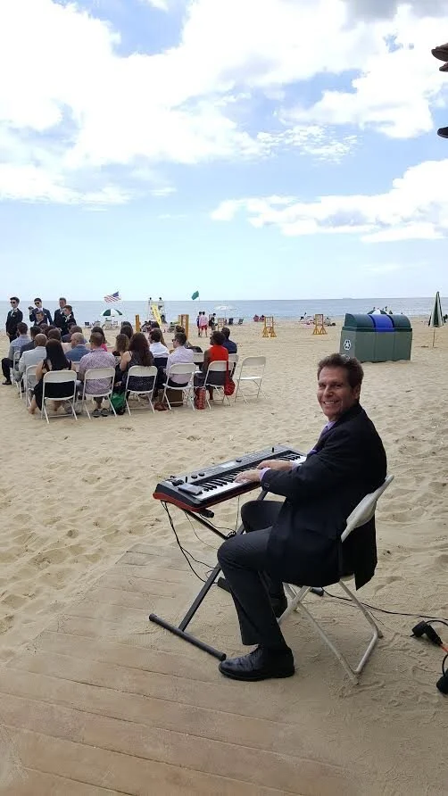 Arnie Playing a NJ Beach Ceremony.jpg