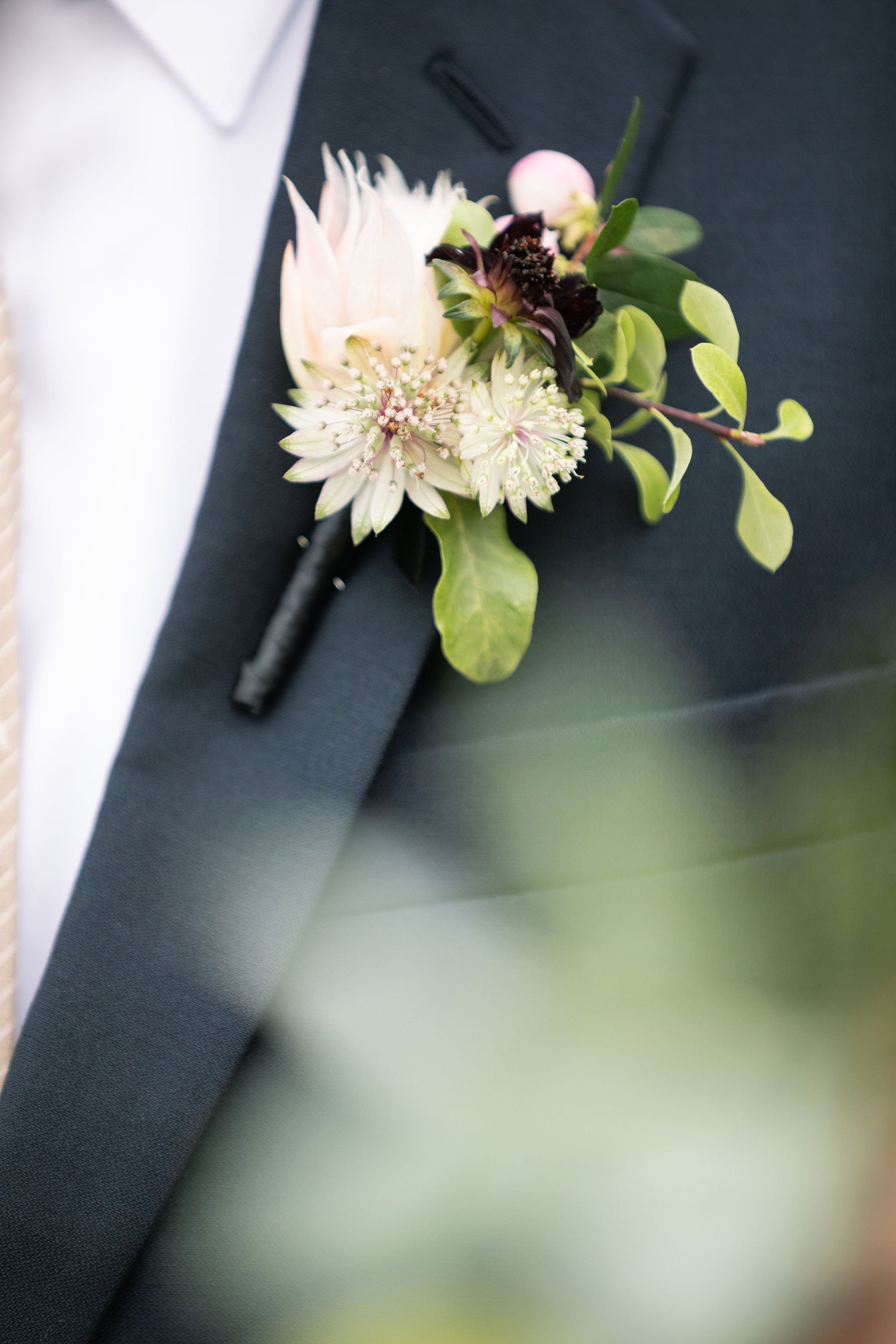 boutonniere white blush burgundy blushingbride elaine.jpg